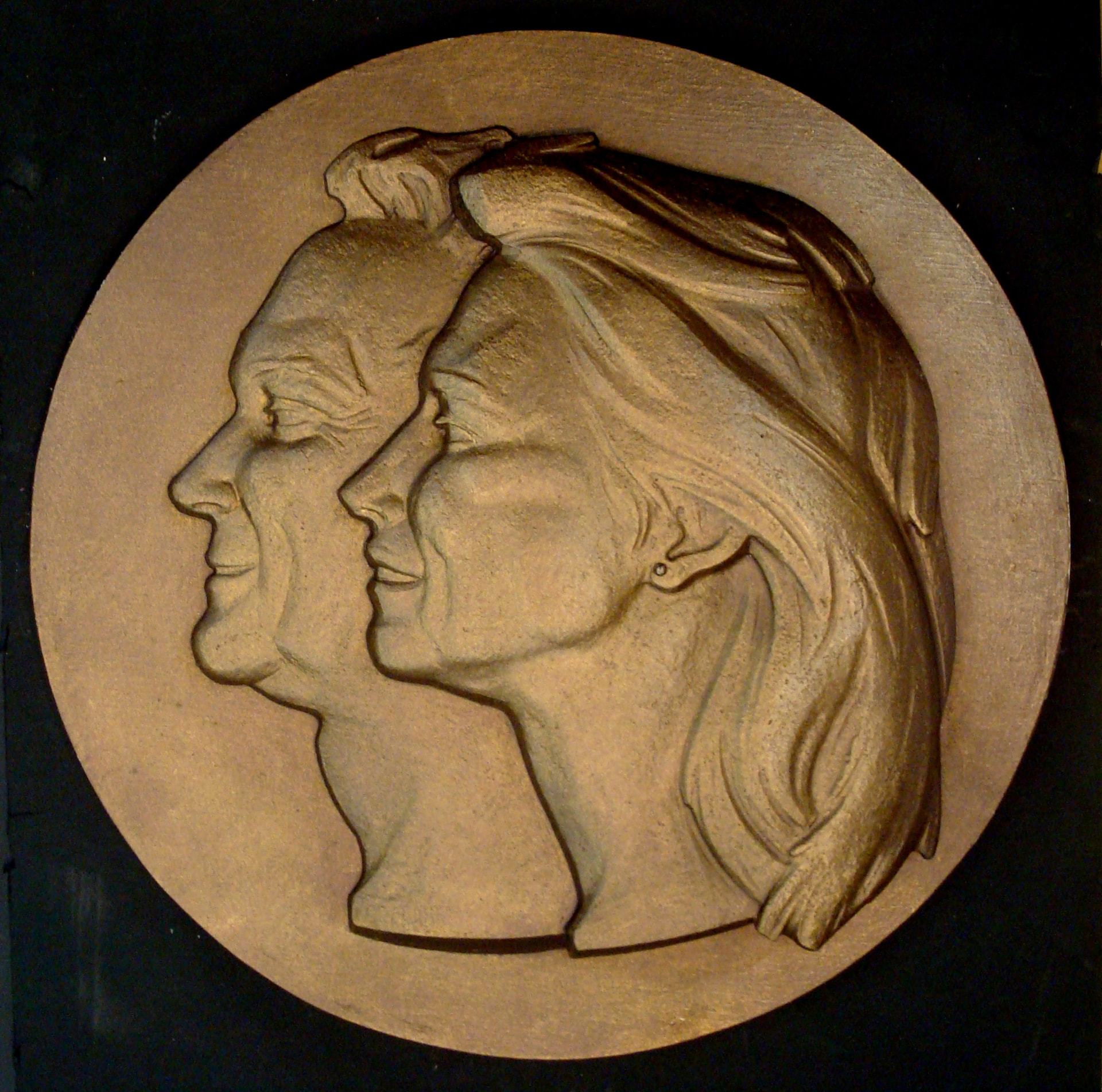 Bronze double-portrait relief medallion