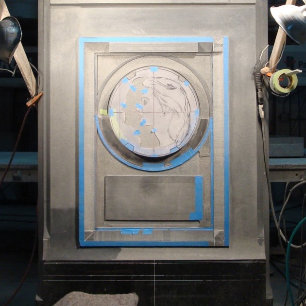Stone memorial with relief layout in progress